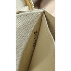 Louis Vuitton - Porte-monnaie / cartes zippé