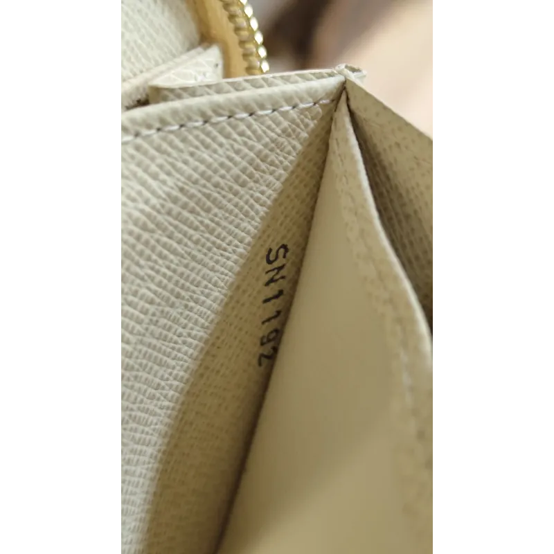 Louis Vuitton - Porte-monnaie / cartes zippé