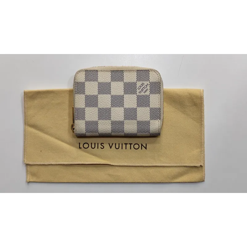 Louis Vuitton - Porte-monnaie / cartes zippé