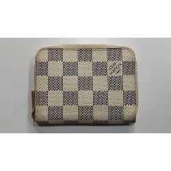 Louis Vuitton - Porte-monnaie / cartes zippé