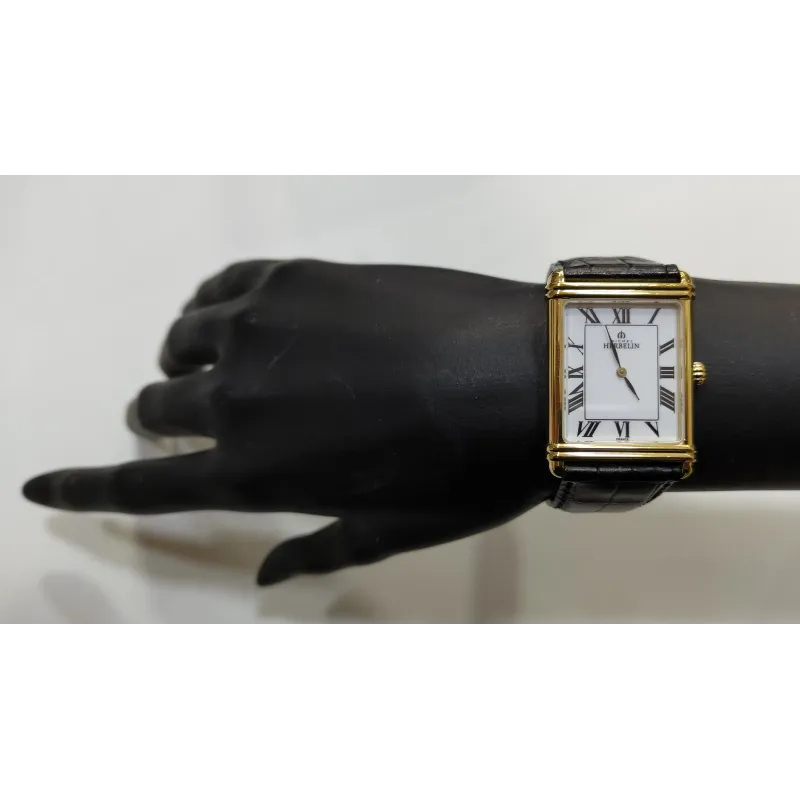 Michel Herbelin – Montre rectangulaire dorée