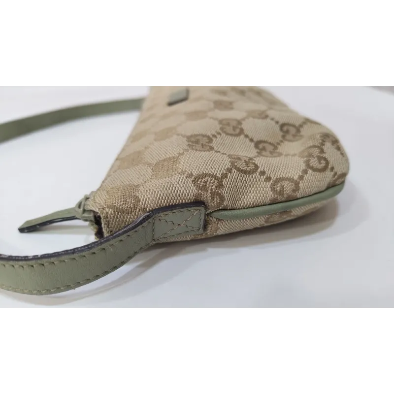 Gucci - Pochette en toile monogramme GG
