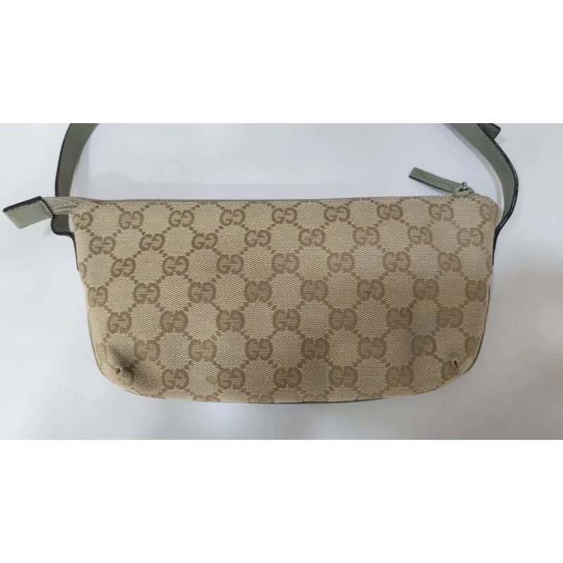 Gucci - Pochette en toile monogramme GG