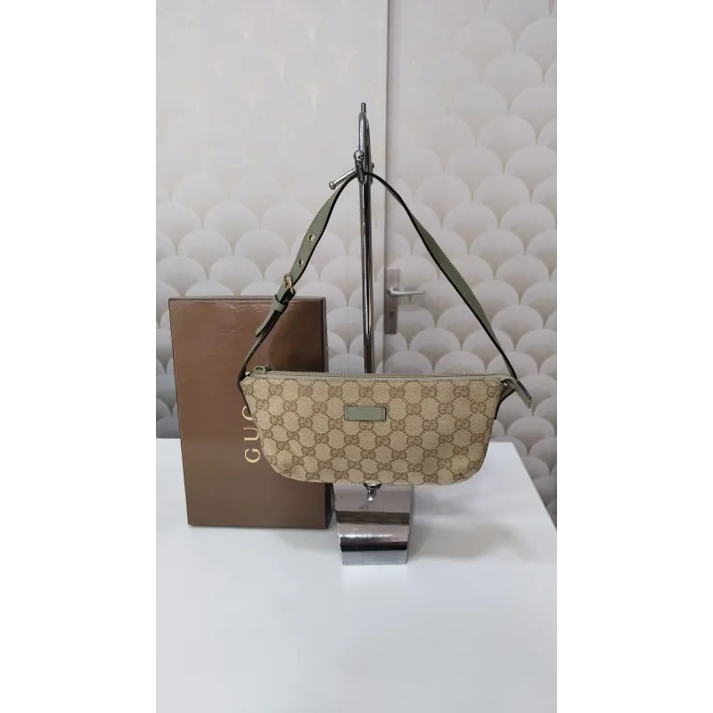 Gucci - Pochette en toile monogramme GG
