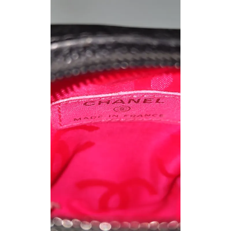 Chanel - Mini pochette en cuir