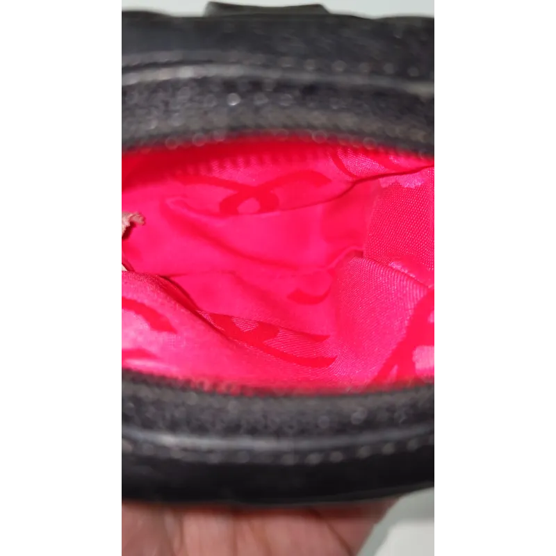 Chanel - Mini pochette en cuir