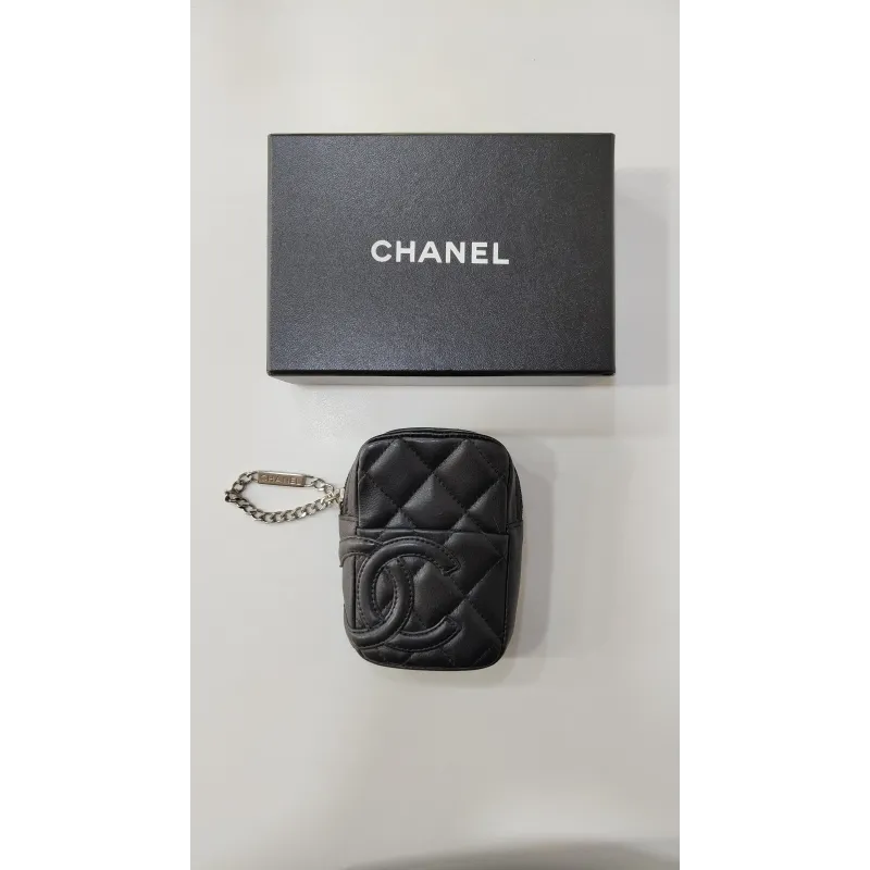 Chanel - Mini pochette en cuir