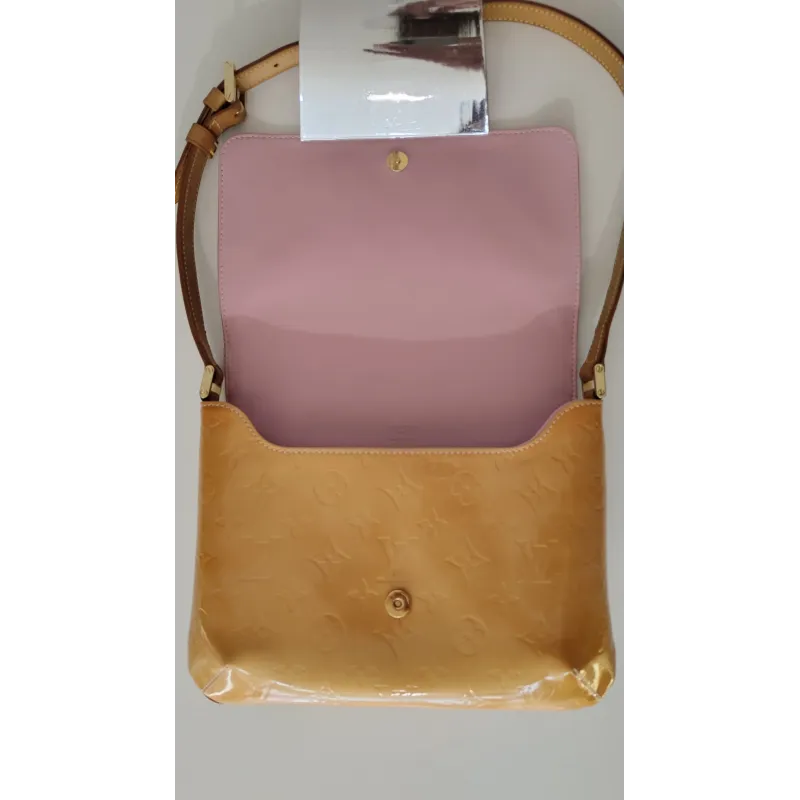 Louis Vuitton - Sac à main en cuir verni Thompson