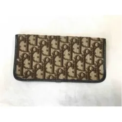 Portefeuille en cuir et toile monogramme