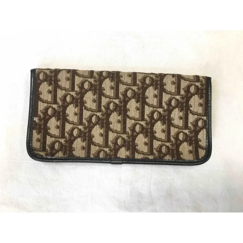 Portefeuille en cuir et toile monogramme