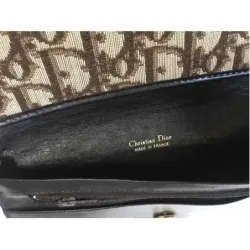 Portefeuille en cuir et toile monogramme