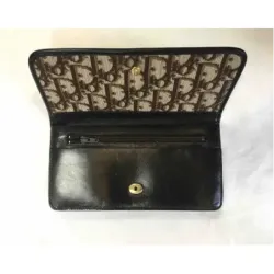 Portefeuille en cuir et toile monogramme