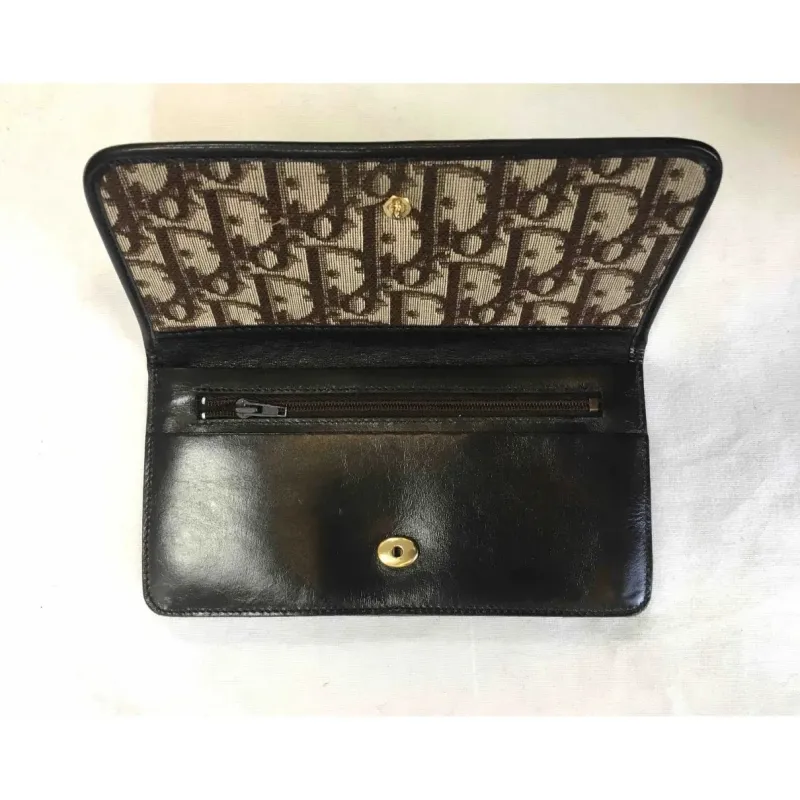Portefeuille en cuir et toile monogramme