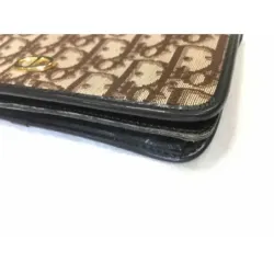 Portefeuille en cuir et toile monogramme