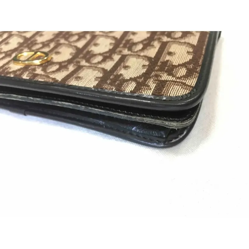 Portefeuille en cuir et toile monogramme