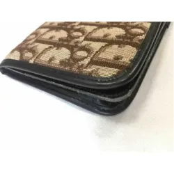 Portefeuille en cuir et toile monogramme