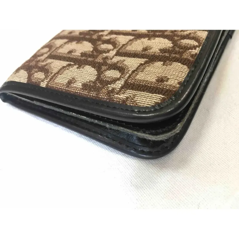 Portefeuille en cuir et toile monogramme