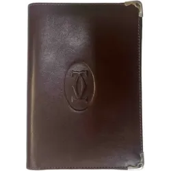 Porte-cartes / feuille en cuir bordeaux et bordures en métal doré
