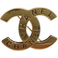 Broche en métal doré