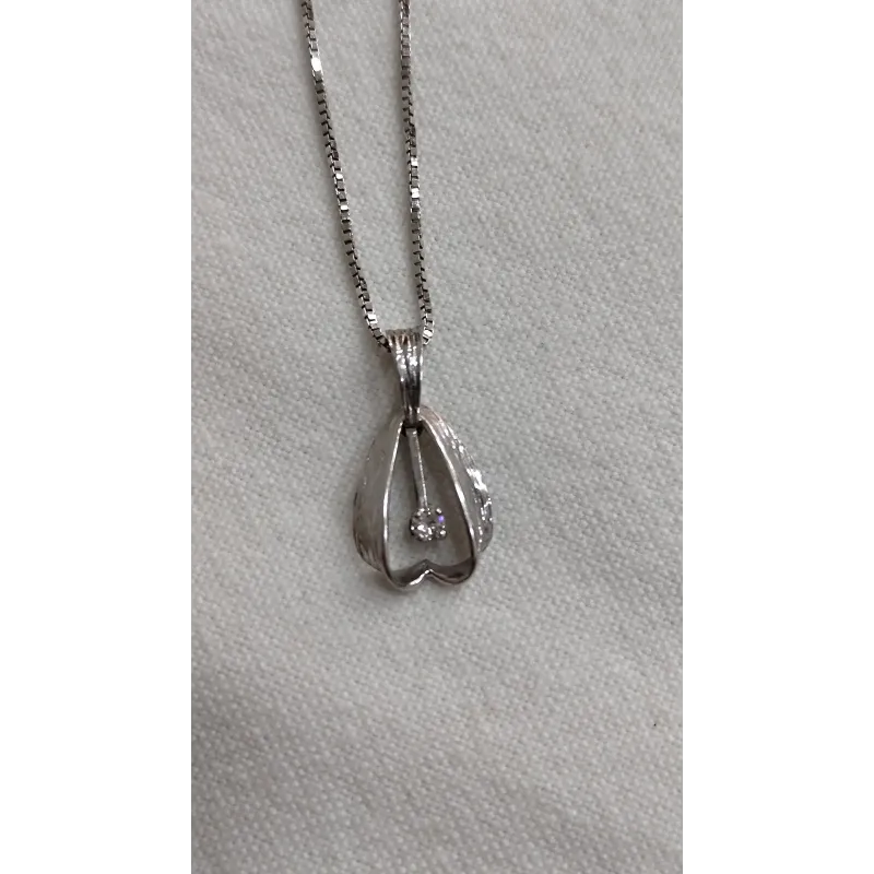 Collier en or blanc et diamant